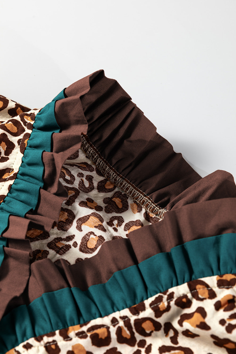 KaleaBoutique Stylish Leopard Print Contrast Frilled Trim Button Down V Neck Shirt - KaleaBoutique.com