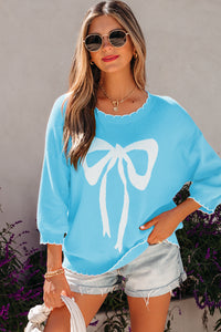KaleaBoutique Comfortable Big Ribbon Bow Print Contrast Stitch Trim Drop Shoulder Sweater - KaleaBoutique.com