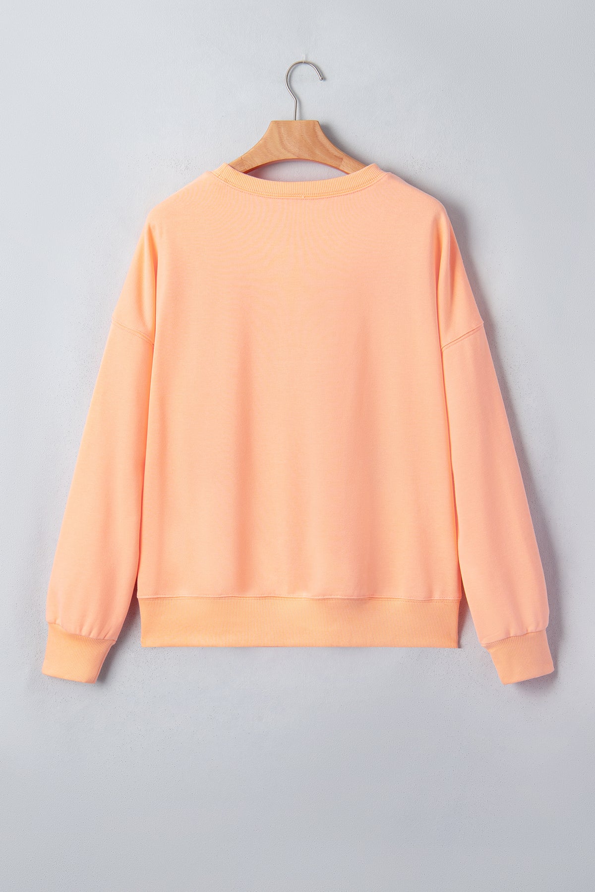 KaleaBoutique Stylish Orange Embroidered Pumpkin Face Drop Shoulder Sweatshirt - KaleaBoutique.com
