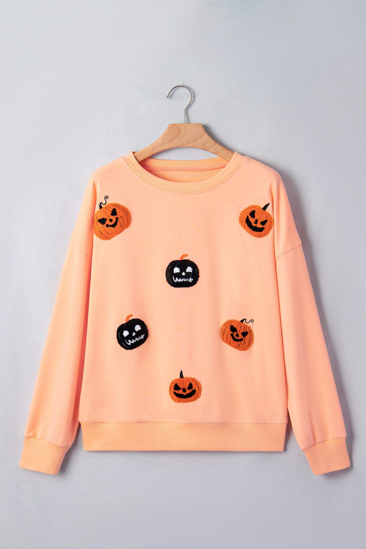KaleaBoutique Stylish Orange Embroidered Pumpkin Face Drop Shoulder Sweatshirt - KaleaBoutique.com