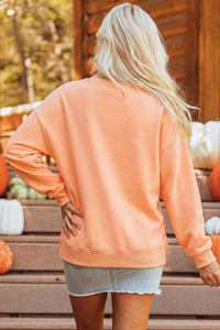 KaleaBoutique Stylish Orange Embroidered Pumpkin Face Drop Shoulder Sweatshirt - KaleaBoutique.com