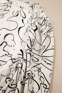 KaleaBoutique Abstract Print Balloon Sleeve Crew Neck Blouse - KaleaBoutique.com