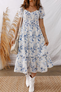 Smocked Bodice Short Puff Sleeve Tiered Floral Midi Dress - KaleaBoutique.com