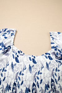 Smocked Bodice Short Puff Sleeve Tiered Floral Midi Dress - KaleaBoutique.com