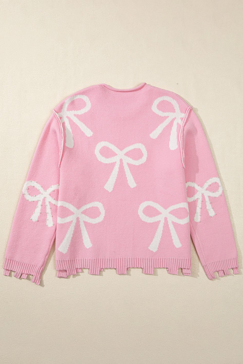 KaleaBoutique Pearl Beaded Bowknot Pattern Distressed Split Hem Sweater - KaleaBoutique.com