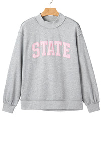 KaleaBoutique Comfortable Exposed Seam Mock Neck STATE Letter Graphic Loose Sweatshirt - KaleaBoutique.com