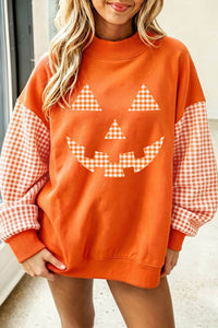 Russet Orange Pumpkin Face Halloween Sweatshirt with Plaid Sleeves - KaleaBoutique.com
