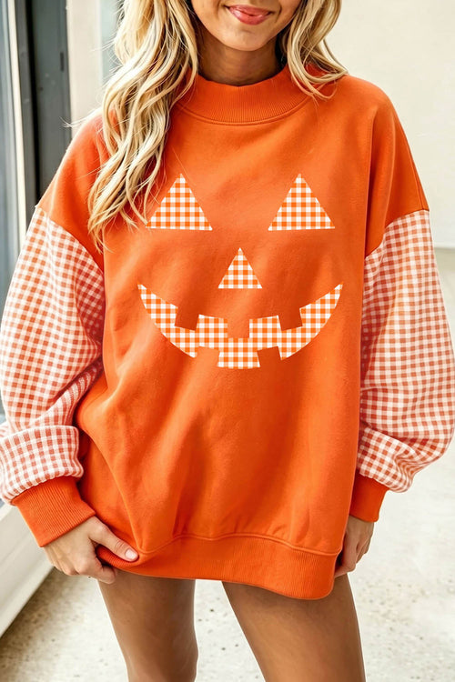 Russet Orange Pumpkin Face Halloween Sweatshirt with Plaid Sleeves - KaleaBoutique.com