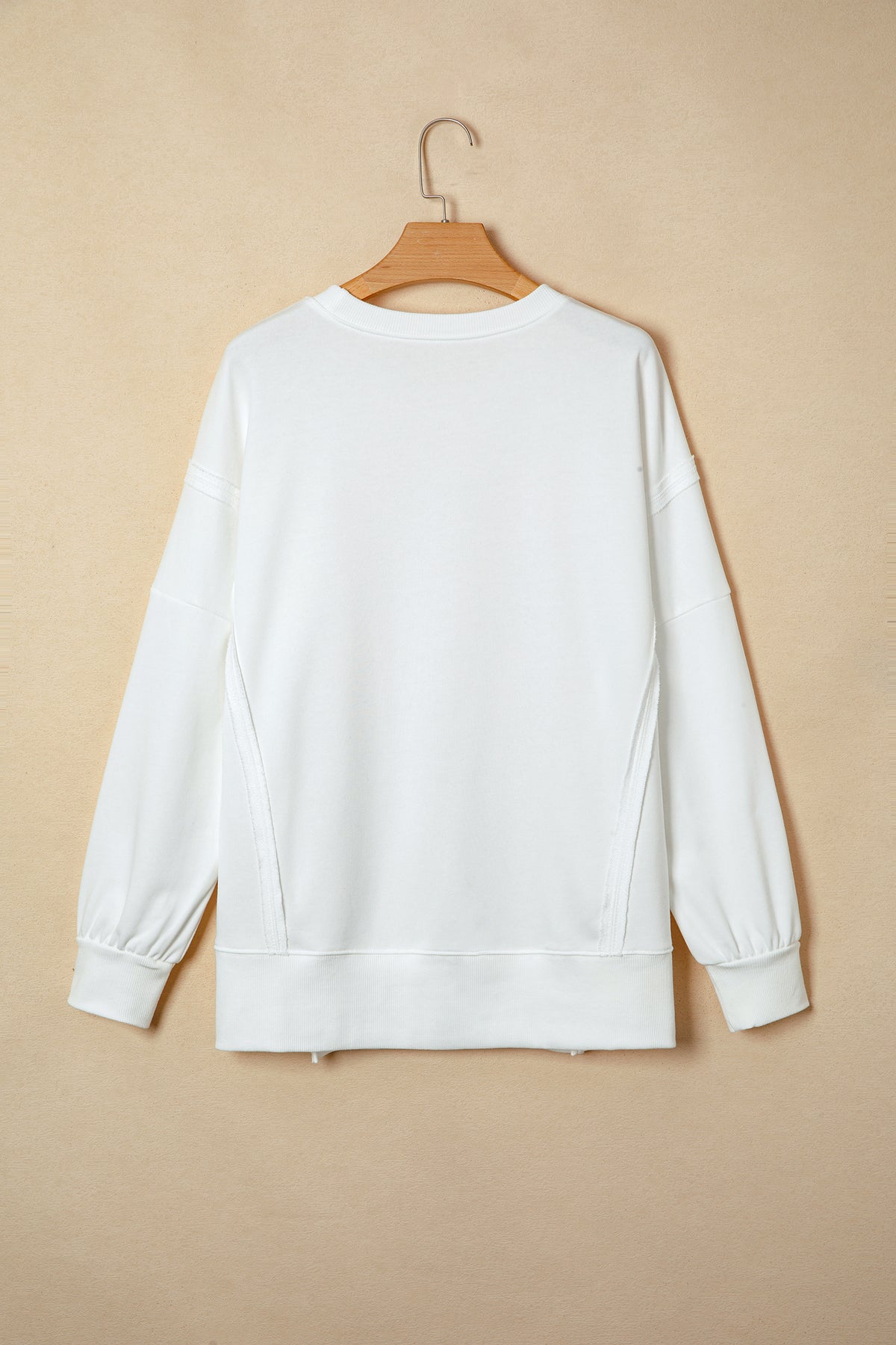KaleaBoutique Stylish Bow Sequin XOXO Letter Graphic Exposed Seam Baggy Sweatshirt - KaleaBoutique.com