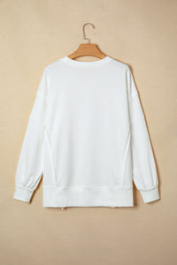 KaleaBoutique Stylish Bow Sequin XOXO Letter Graphic Exposed Seam Baggy Sweatshirt - KaleaBoutique.com