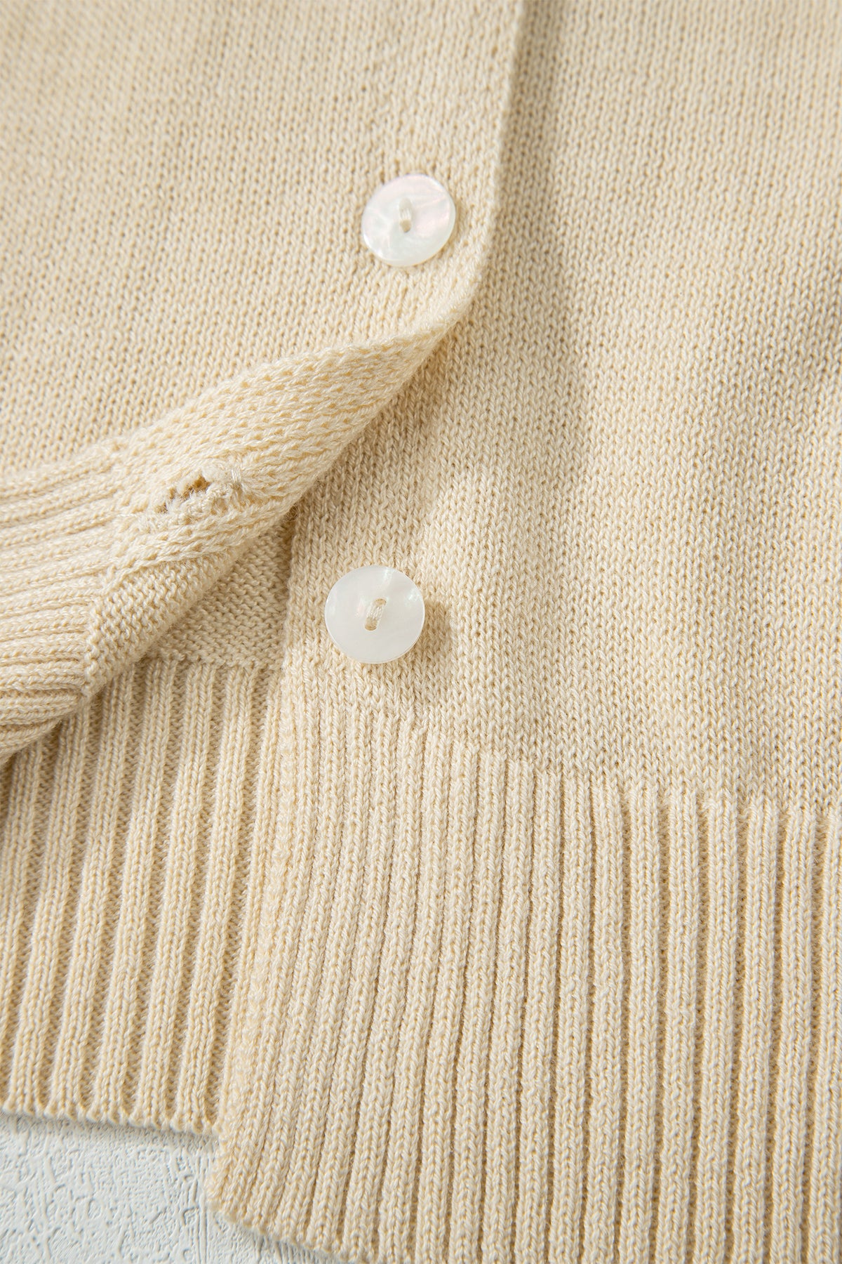 KaleaBoutique Stylish Buttoned Front Rolled Hem Cap Sleeve Sweater Top - KaleaBoutique.com