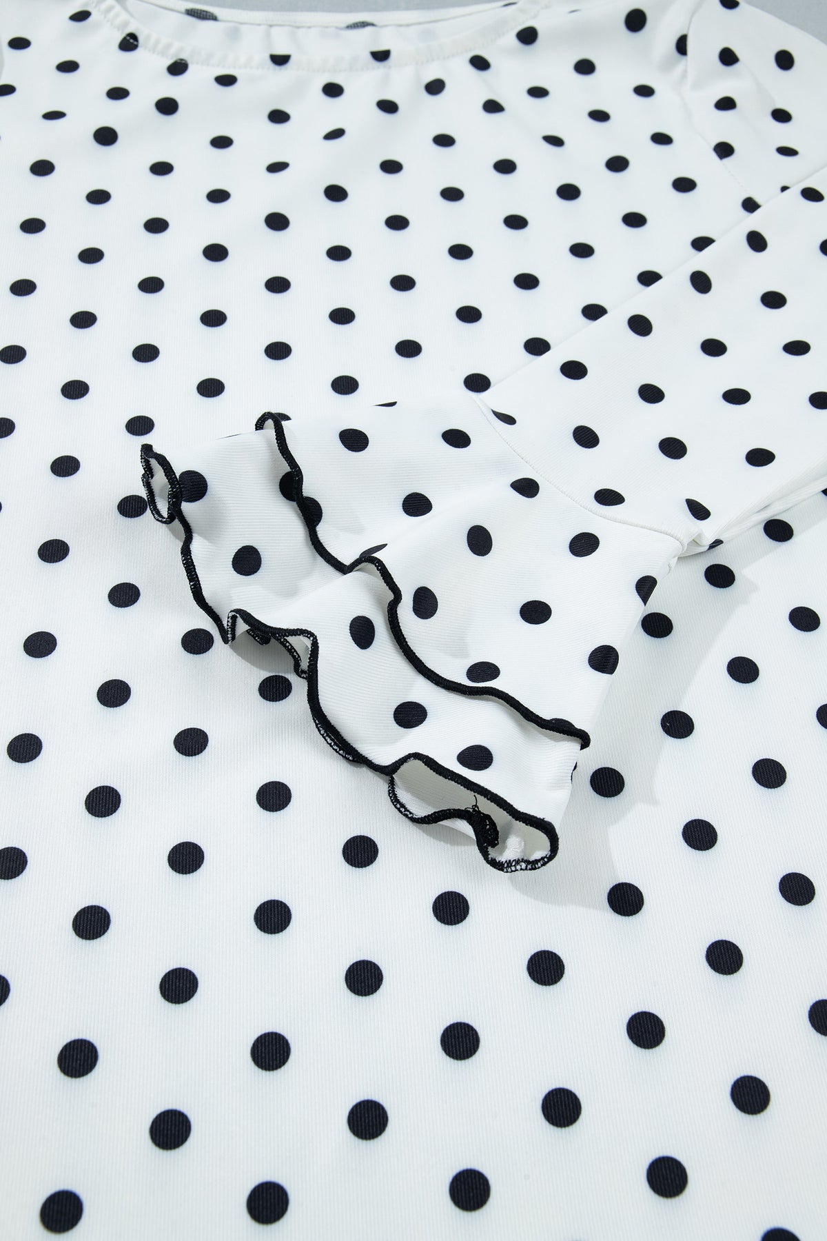 KaleaBoutique Stylish Polka Dot Print Lettuce Trim Long Sleeve Top - KaleaBoutique.com