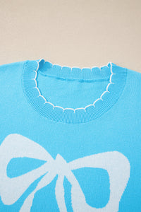 KaleaBoutique Comfortable Big Ribbon Bow Print Contrast Stitch Trim Drop Shoulder Sweater - KaleaBoutique.com