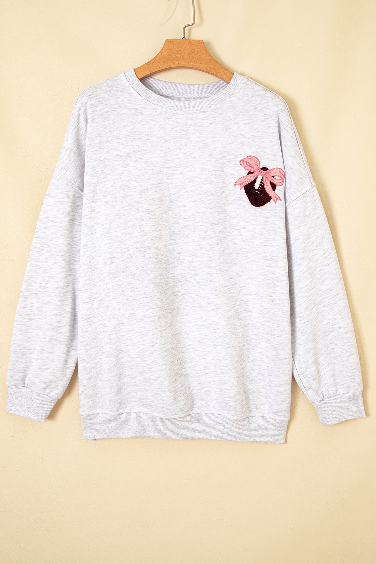 KaleaBoutique Comfortable Embroidered Football Bow Back Long Sleeve Sweatshirt - KaleaBoutique.com
