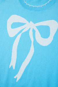 KaleaBoutique Comfortable Big Ribbon Bow Print Contrast Stitch Trim Drop Shoulder Sweater - KaleaBoutique.com