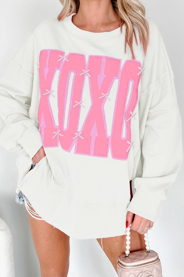 KaleaBoutique Stylish Bow Sequin XOXO Letter Graphic Exposed Seam Baggy Sweatshirt - KaleaBoutique.com