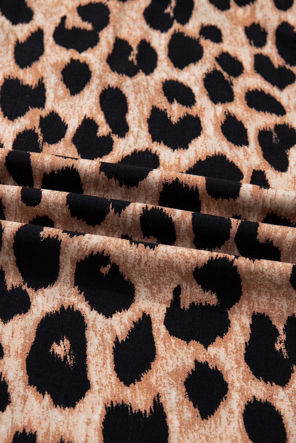 KaleaBoutique Stylish Leopard Print Smocked Detail Flowy Midi Dress - KaleaBoutique.com