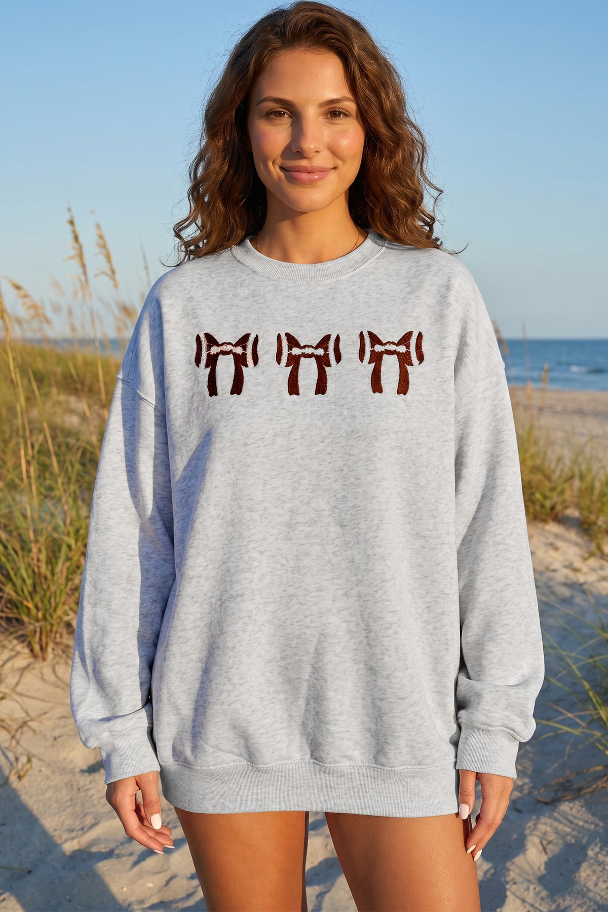KaleaBoutique Comfortable Chenille Embroidered Rugby Bow Game Day Oversized Sweatshirt - KaleaBoutique.com