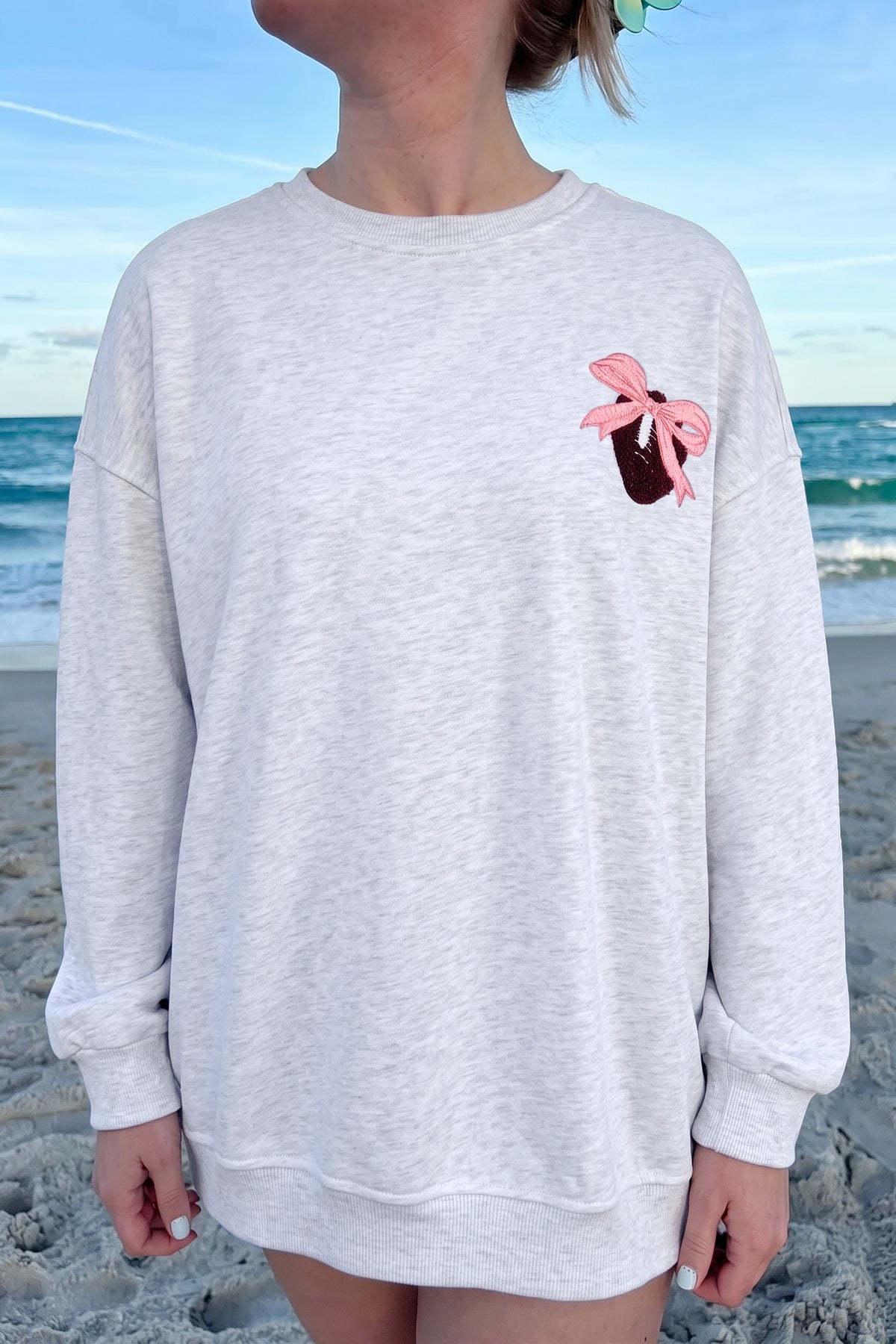 KaleaBoutique Comfortable Embroidered Football Bow Back Long Sleeve Sweatshirt - KaleaBoutique.com