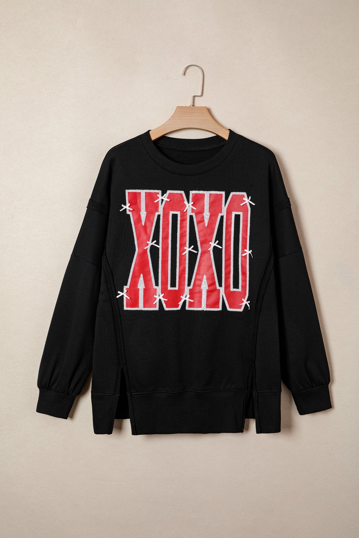KaleaBoutique Stylish Bow Sequin XOXO Letter Graphic Exposed Seam Baggy Sweatshirt - KaleaBoutique.com