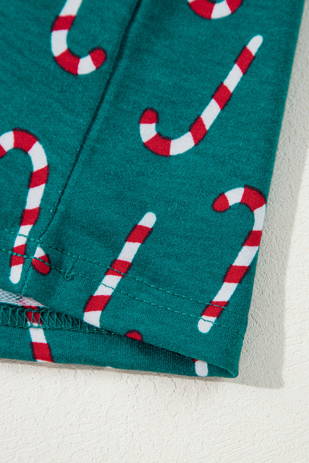 KaleaBoutique Stylish Christmas Candy Cane Printed Top and Pants Lounge Set - KaleaBoutique.com