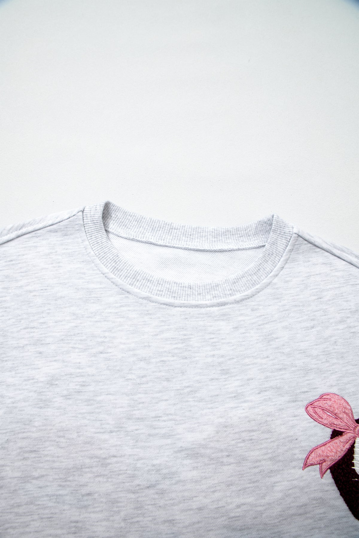 KaleaBoutique Comfortable Embroidered Football Bow Back Long Sleeve Sweatshirt - KaleaBoutique.com