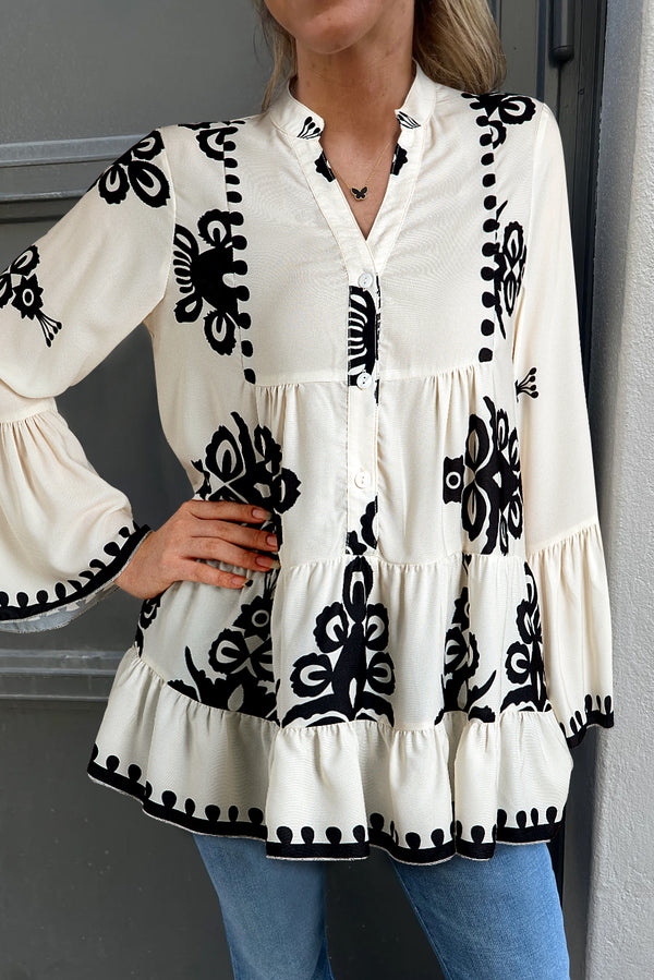 KaleaBoutique Stylish Abstract Printed Bell Sleeve Buttoned Tiered Babydoll Blouse - KaleaBoutique.com