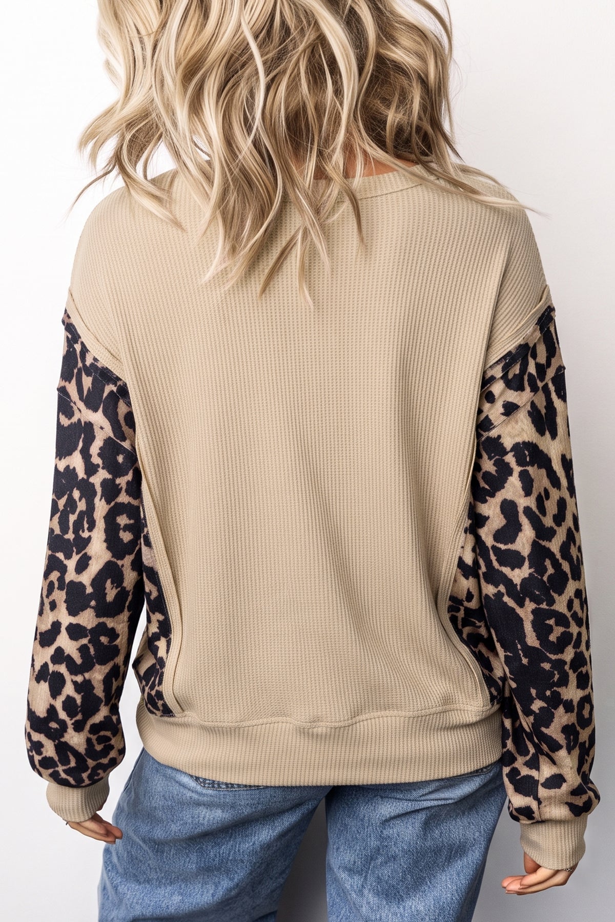 KaleaBoutique Stylish Leopard Sleeve Waffle Knit Split Hem Top - KaleaBoutique.com