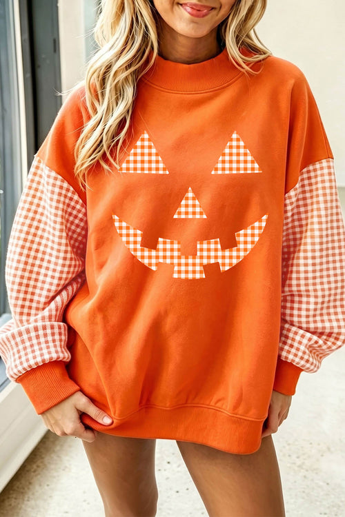 Russet Orange Pumpkin Face Halloween Sweatshirt with Plaid Sleeves - KaleaBoutique.com