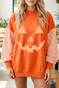 Russet Orange Pumpkin Face Halloween Sweatshirt with Plaid Sleeves - KaleaBoutique.com