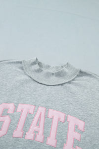 KaleaBoutique Comfortable Exposed Seam Mock Neck STATE Letter Graphic Loose Sweatshirt - KaleaBoutique.com