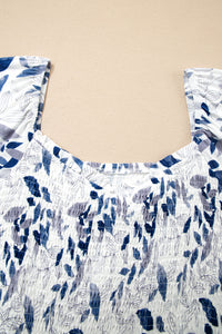 Smocked Bodice Short Puff Sleeve Tiered Floral Midi Dress - KaleaBoutique.com