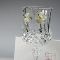 White Flower Dangle Crystal Charm Hoop Earrings, Omega Latch Back Gold Hoop Earrings with Removable Dangles - KaleaBoutique.com