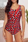 KaleaBoutique Stylish Animal Print Criss Cross Back One Piece Swimsuit - KaleaBoutique.com